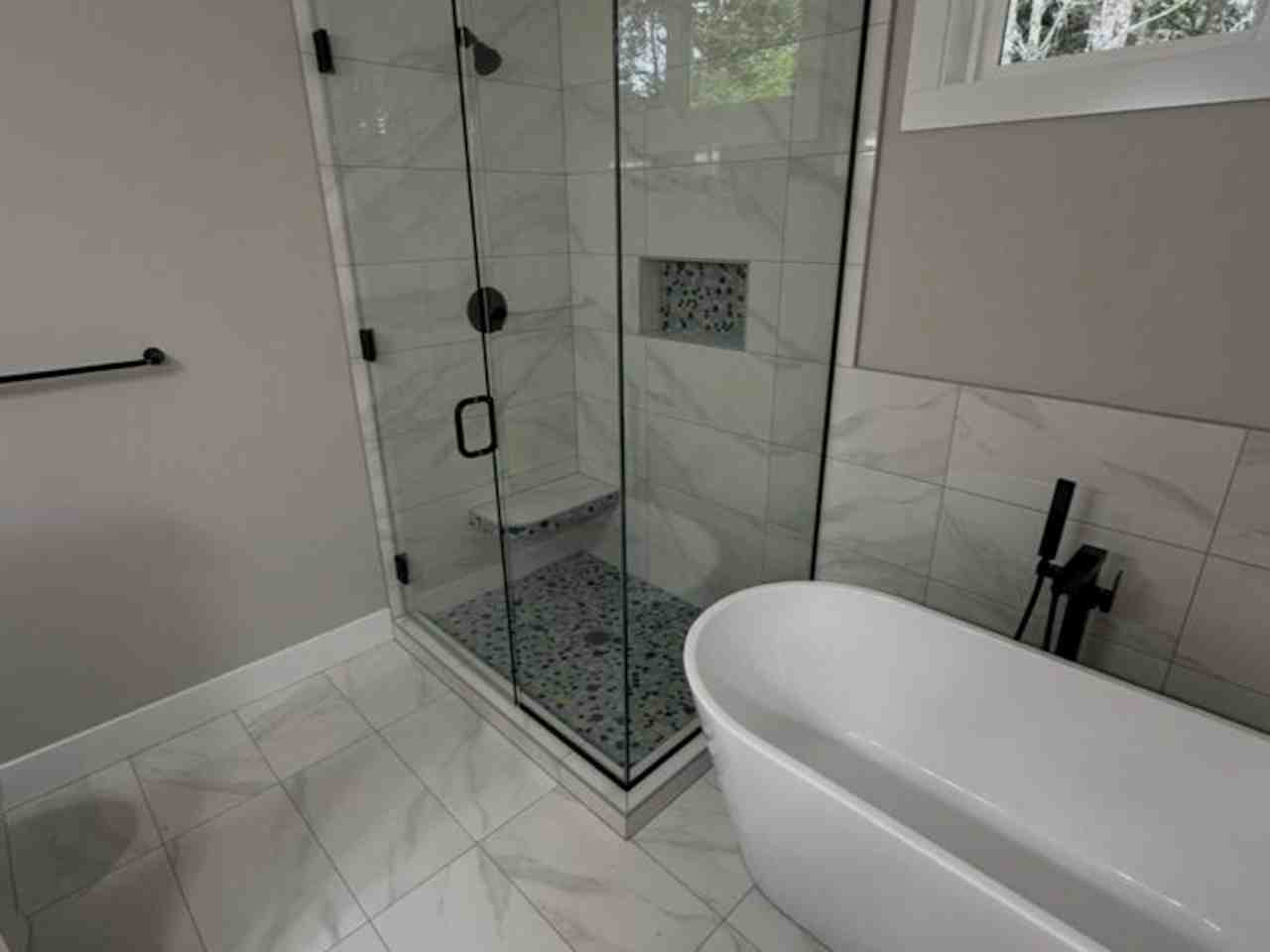 Full shower remodeling project by One Construction LLC